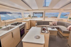 Salon and galley on board Fountaine Pajot FP 48 - For sale in the Caribbean by yacht dealer Caribbean Multihulls